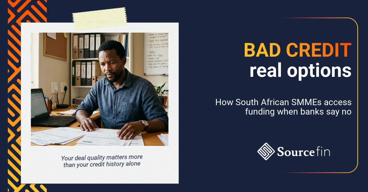 Loans for bad credit South Africa – determined SMME owner reviewing funding paperwork at his desk